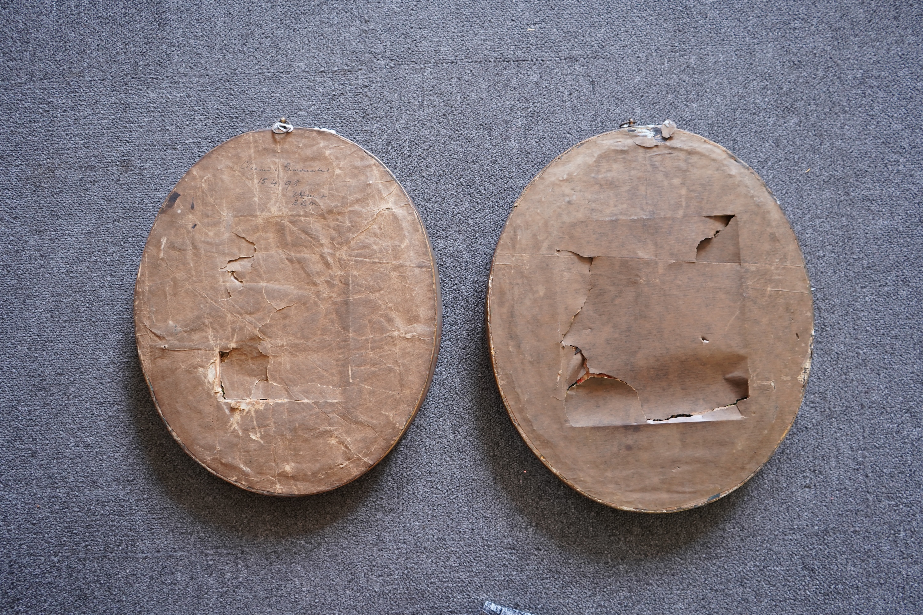 A pair of unusual early 19th century oval silk Chenille embroideries, one depicting a seated lady surrounded by a lion and donkey, the other depicting a seated shepherdess under tree with two sheep. Both have water colou